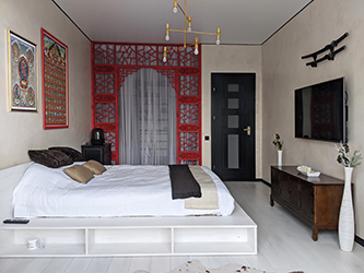 This design was created around numerous Tibetan Buddhist items I've gathered from my time in Nepal. Many elements were ordered from China making this apartment a very special case of «made in China» meaning being purely authentic. The elements of the room divider, for example, were handmade in China.