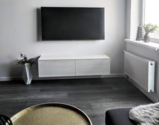 TV area is as minimalist as it can get and consists only of subtle hues of white.